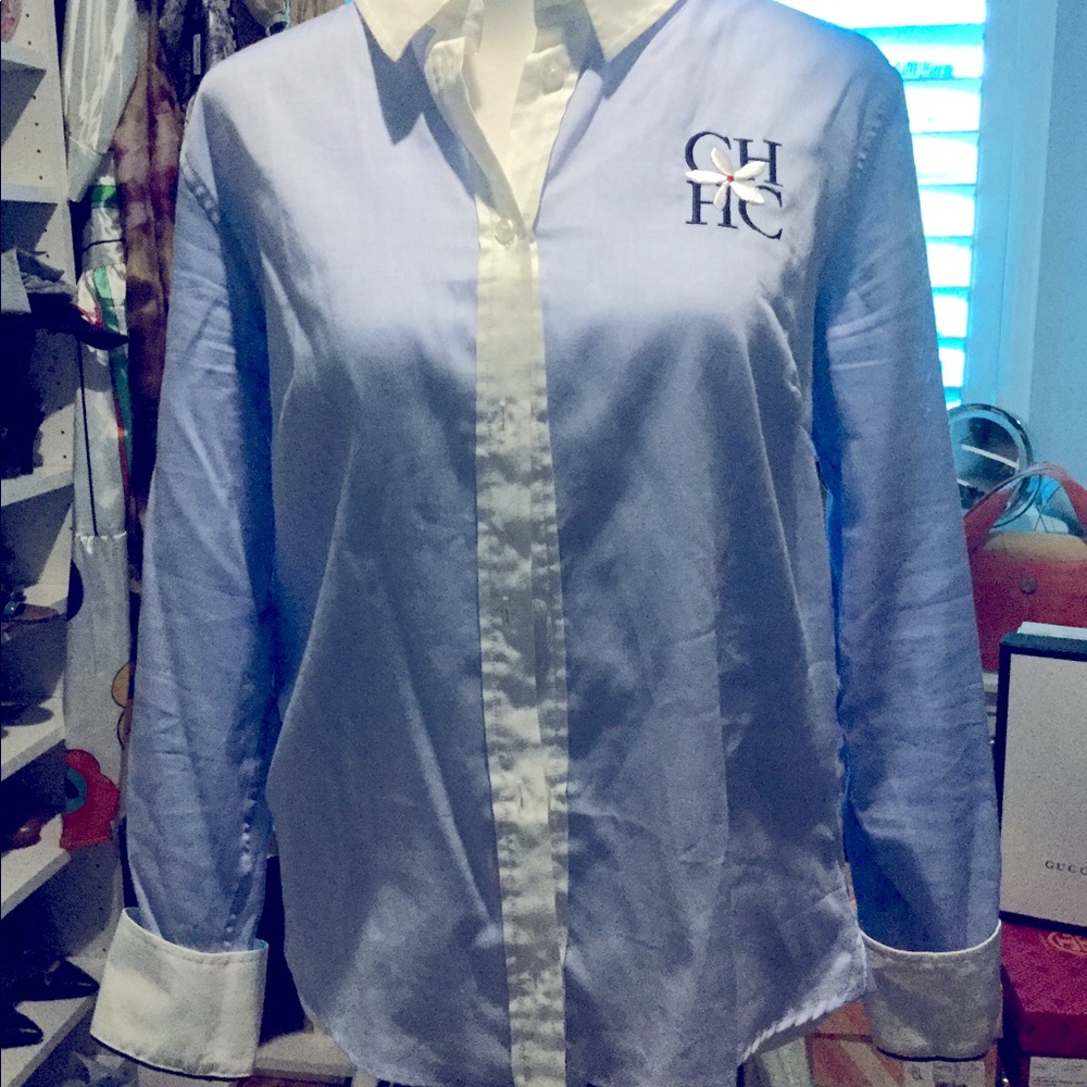 Light blue Carolina Herrera button down shirt.